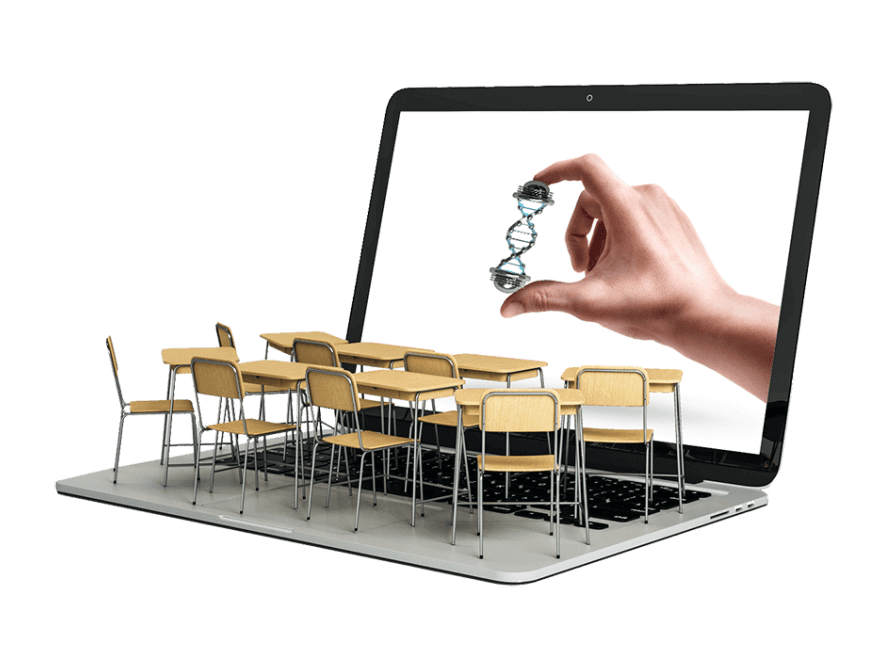 classroom tables on the keyboard of a laptop displaying a hand holding a dna strand